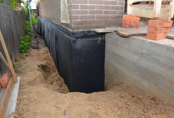 SJ Waterproofing Pros technician performing targeted Foundation Crack Repair assessment in Doyle, TN